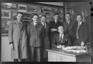 Unidentified members from the Bristol Freighter crew and Whites Aviation staff, in offices of Whites Aviation Ltd