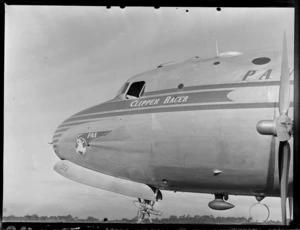 Front/side view of aircraft Douglas DC-4 Clipper Racer, PAWA (Pan America World Airways), unidentified location