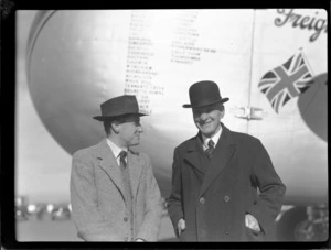 Bristol Freighter Tour, portrait of (L to R) A R Gruthrey (City Councillor) and E H Andrews (Mayor of Chrictchurch) in front of Bristol Freighter transport plane 'Merchant Venturer' G-AIMC, Harewood Airport, Christchurch City