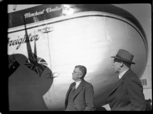 Bristol Freighter Tour, portrait of (L to R) N M McLaren (President Nelson Aero Club) and G R McKellor (Nelson Chamber of Commerce), in front of Bristol Freighter transport plane 'Merchant Venturer' G-AIMC, Nelson Airport