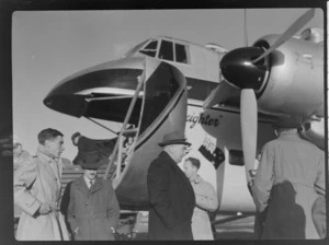 Bristol Freighter Tour, view of (L to R) M F Elliot (Bristol Sales Representative), T O'Connell and J Sawers in front of Bristol Freighter transport plane 'Merchant Venturer' G-AIMC, Paraparaumu Airport, North Wellington Region