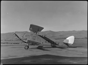 Bristol Freighter Tour, view of NZ NAC Fox Moth ZK-AEK passenger biplane on the runway, Omaka Airport, Blenheim, Marlborough Region