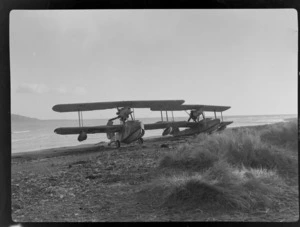 Bristol Freighter Tour, view of two RNZAF Supermarine Walrus Mk I Seaplanes owned by J M Gould on a Paraparaumu Beach, North Wellington Region