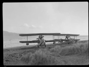 Bristol Freighter Tour, view of two RNZAF Supermarine Walrus Mk I Seaplanes owned by J M Gould on a Paraparaumu Beach, North Wellington Region