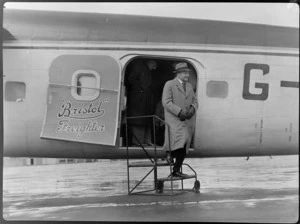 Sir Bernard Freyberg, the Governor-General of New Zealand, disembarking Bristol Freighter transport aeroplane 'Merchant Venturer', during an inspection of the aircraft, Rongotai Airport, Wellington