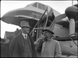 Mr Bellringer with Mr Watts, of New Plymouth Aero Club, at New Plymouth Airport for the visit of Bristol Freighter transport aeroplane 'Merchant Venturer'