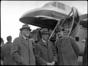 Mr CH Wynward, (NPAB), left, with Mr ERC Gilmour, Mayor of New Plymouth, and Mr AF Sandford, at New Plymouth Airport, during tour visit of Bristol Freighter transport aeroplane 'Merchant Venturer'