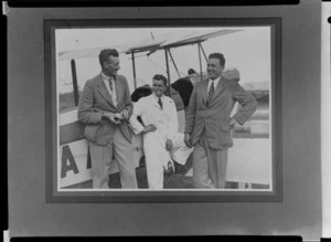 Group of men, near an aircraft, (from left), Mr Mac McGregor, Scott Fraser and Mr D B Allan, location unidentified