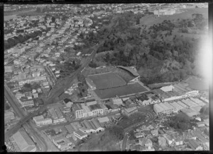 Rugby match, New Zealand versus Great Britain, Carlaw Park, Auckland, including industrial area and housing