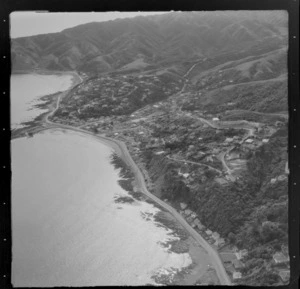 View over the coastal settlement of Plimmerton with Karehana Bay and Moana Road in foreground to Hongoeka Bay and Mount Porirua beyond, Porirua District, Wellington Region