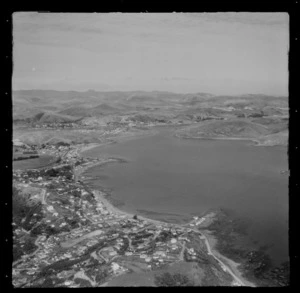 View over the coastal settlement of Plimmerton with Karehana Bay, the Plimmerton Boating Club buildings and Moana Road in the foreground to Mana and Paremata beyond, Porirua District, Wellington Region
