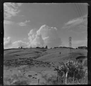 Rangiriri rural, view of farmland hills with electric power pylons, Waikato Region