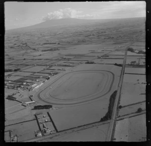 Hawera Racecourse with Waihi Road in foreground surrounded by farmland, looking to Mount Taranaki