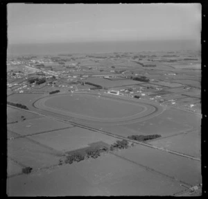 Hawera Racecourse with Waihi Road in foreground surrounded by farmland, looking to the town of Hawera, Taranaki Region