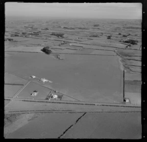 View of Hawera Airfield with Waihi Road in foreground surrounded by farmland, Hawera District, Taranaki Region