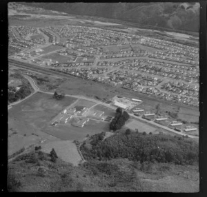 The suburb of Taita with Taita College and the Eastern Hutt Road in foreground and the Hutt River beyond, Lower Hutt Valley, Wellington Region