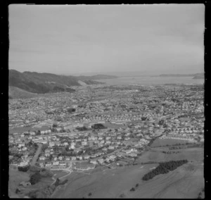 View south over the Lower Hutt Valley and City with the Hutt Golf Club links in foreground and Hutt Hospital with Wellington Harbour beyond