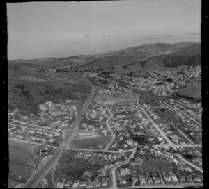 View over Tawa Flat with the Porirua-Johnsonville Motorway, Linden Primary School and the communities of Raroa Park, Linden, Tawa and Redwood, Wellington City