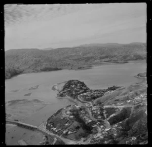 View over Pauatahanui Inlet and the suburb of Paremata with road and rail bridge in foreground and Golden Gate Peninsula, Porirua District, Wellington Region