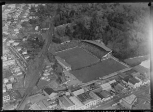 Rugby match, New Zealand versus Great Britain, Carlaw Park, Auckland, including industrial area
