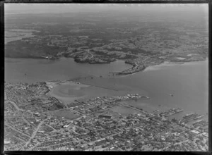 Construction of the Auckland Harbour bridge, including Westhaven Marina and Saint Marys Bay, looking out to Northcote