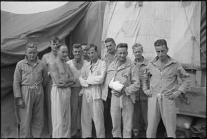 Informal group outside tent at advanced dressing station of 4 NZ Field Ambulance in northern Italy, World War II - Photograph taken by George Kaye