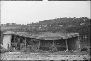 German mine causes building to sag, north of Pesaro, Italy, World War II - Photograph taken by George Kaye