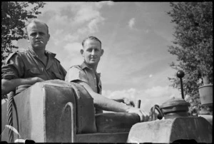 C D Bell and J H Robb at bulldozer controls near Riccione, Italy, World War II - Photograph taken by George Kaye