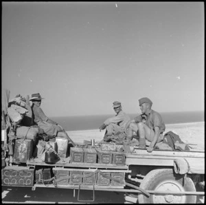 World War II New Zealand soldiers on a gun portee travelling up the Halfaya Pass, Egypt - Photograph taken by H Paton