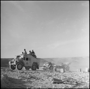 A 6 New Zealand Field Regiment tractor and gun climbing Halfaya Pass in Egypt, World War II - Photograph taken by H Paton