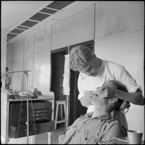 New Zealander receiving dental treatment at the New Zealand Convalescent Depot at Kfar Vitkin, Palestine, World War II - Photograph taken by H Paton