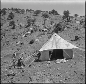 Tent provides the orderly room of a New Zealand Unit in Syria during World War II - Photograph taken by H Paton