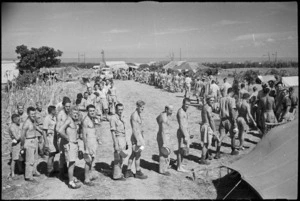 New Zealand soldiers at Rest Camp, near Ancona, file through cookhouse for midday meal, Italy, World War II - Photograph taken by George Kaye
