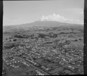 View over the farming town of Eltham with Tayler Street in foreground to the Eltham Bowling Club and Taumata Park, to farmland and Mount Taranaki beyond