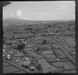 The farming settlement of Midhirst with Beaconsfield Road and Kent Terrace in foreground to farmland and the Pouakai Range beyond, Taranaki Region