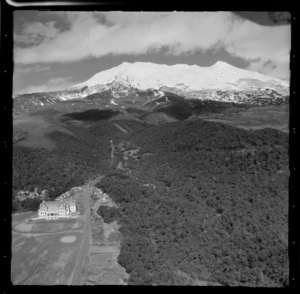 View of the Chateau Tongariro and Whakapapa Village with access road through bush up to the Whakapapa Ski Field and Mount Ruapehu, Manawatu-Whanganui Region