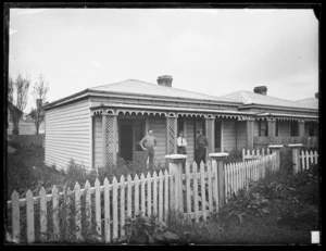 Cottages in Clayton's Avenue, Wellington, and men alongside