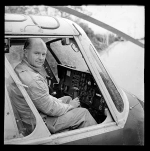Mr F Rudwick inside a helicopter