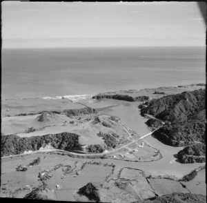 View to the Tongaporutu River and estuary coastal settlement with the Mokau Road Bridge, North Taranaki Region