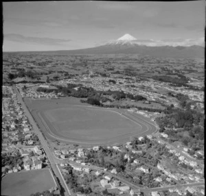 New Plymouth Racecourse with Eliot Street and State Highway 3 in foreground, with farmland and Mount Taranaki beyond, Taranaki Region