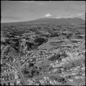 View to the New Plymouth suburb of Lower Vogeltown with Dawson Street in foreground to Western and Sanders Parks, with farmland and Mount Taranaki beyond, Taranaki Region