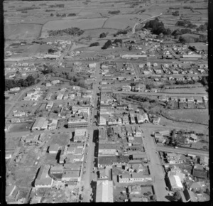 View over the town of Eltham with Bridge Street in the foreground to the railway station, and High Street (State Highway 3) through town, South Taranaki Region