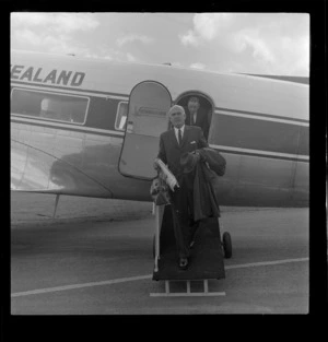 Unidentified man descending from DC3 Viewmaster, South Pacific Airlines of New Zealand, Whakatane Airport opening