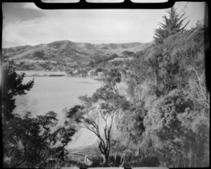 Akaroa, Banks Peninsula, showing harbour and road amongst the trees
