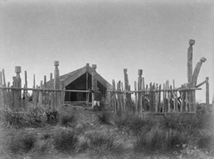Old stockade and whare puni, Whakaki Pa, Wairoa district, with Mr John Hunter Brown
