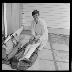 Unidentified female cricket player, [a member of the New Zealand or English national women's team?] with cricket equipment, location unidentified