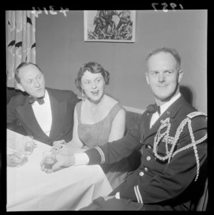 Unidentified woman and two men, at a ball to celebrate 132nd anniversary of United States Marine Corps, Roseland Cabaret, Wellington
