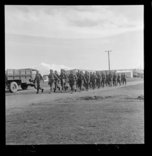 Soldiers for Malaya, marching in formation at Waiouru, Ruapehu district