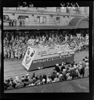 Festival of Wellington parade, showng Good Housekeeping GHB Grocers parade float, and spectators, outside the DIC building, Lambton Quay, Wellington