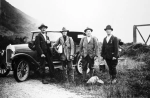 First crossing of the Tararua Range from Levin to Eketahuna; March 4-7, 1927. An early start - 5.40am - from the Pipe Bridge, Gladstone Road: Messrs E S Lancaster, G L Adkin, J Logan and W H Walker, of Levin